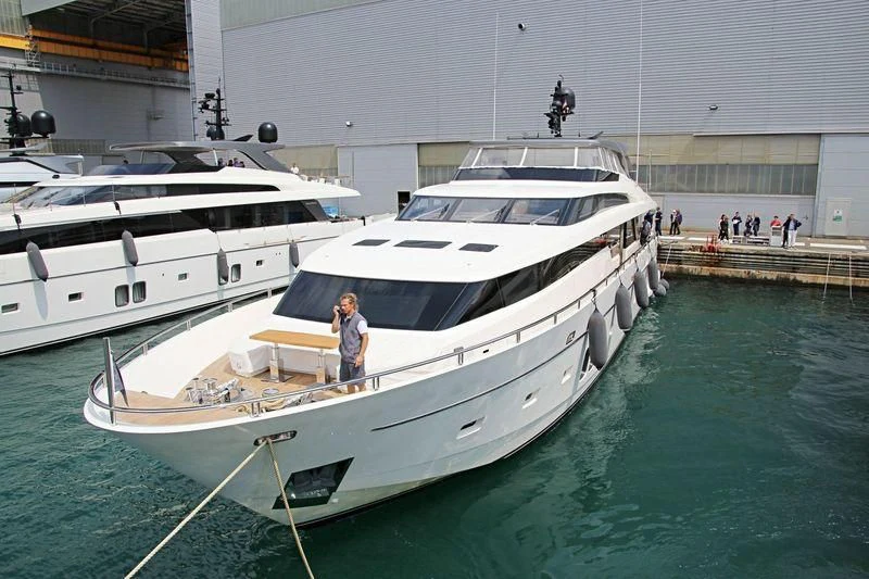 a couple of boats are parked in a harbor aboard THE PHAT BOAT Yacht for Sale