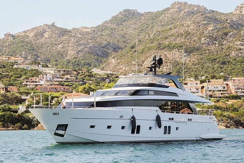 a white yacht on the water aboard THE PHAT BOAT Yacht for Sale
