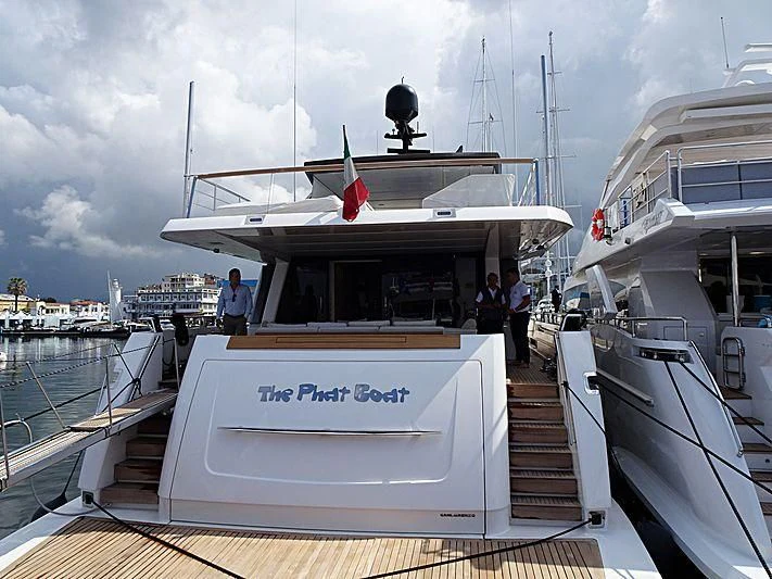 a boat with a group of people on it aboard THE PHAT BOAT Yacht for Sale