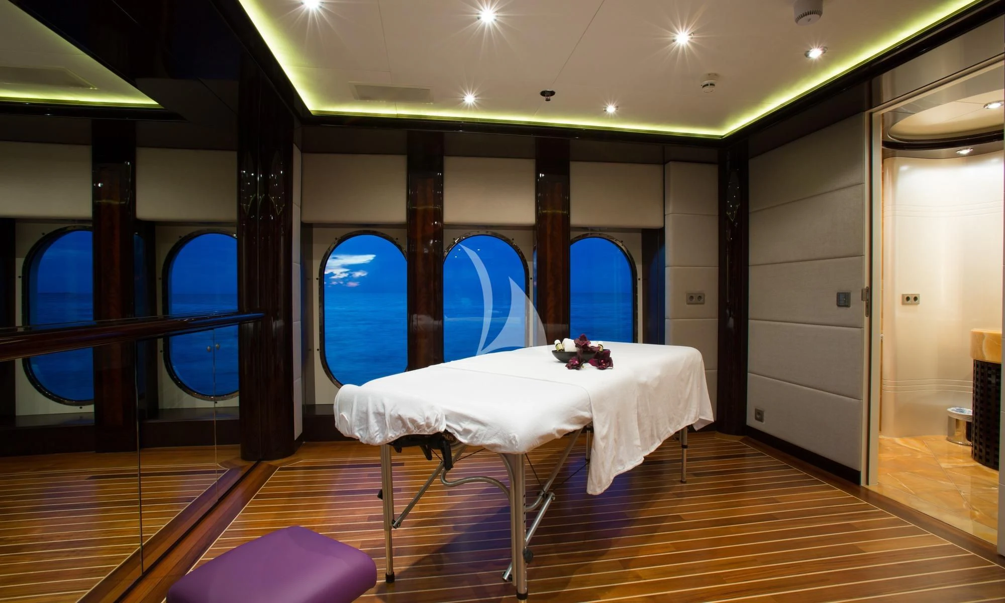 a room with a table and chairs aboard DREAM Yacht for Sale