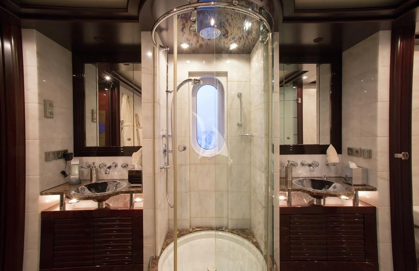 a bathroom with a large mirror aboard DREAM Yacht for Sale