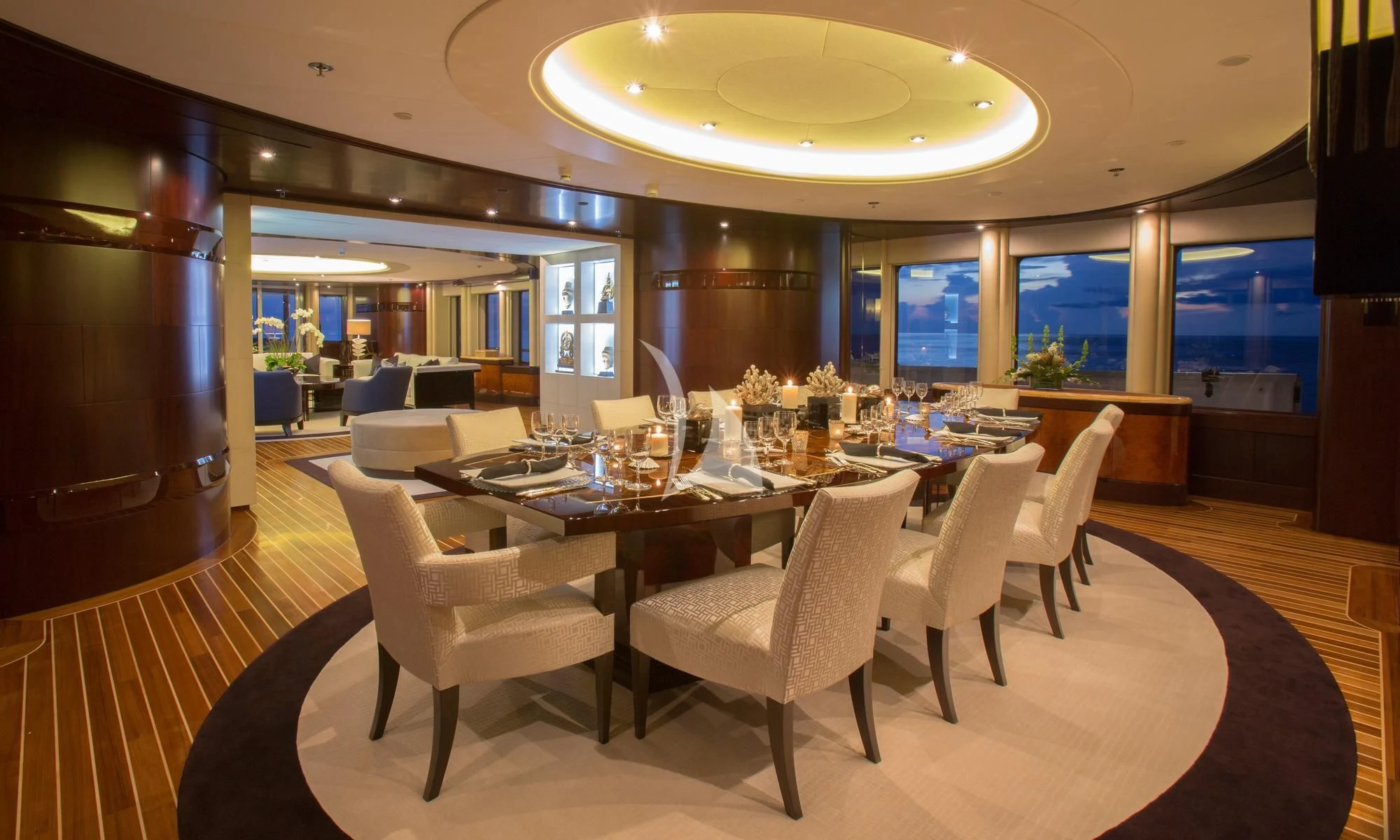 a large dining room with a large table and chairs aboard DREAM Yacht for Sale