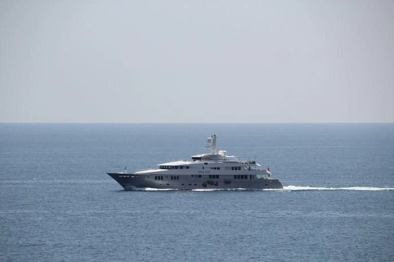a large ship in the water aboard DREAM Yacht for Sale