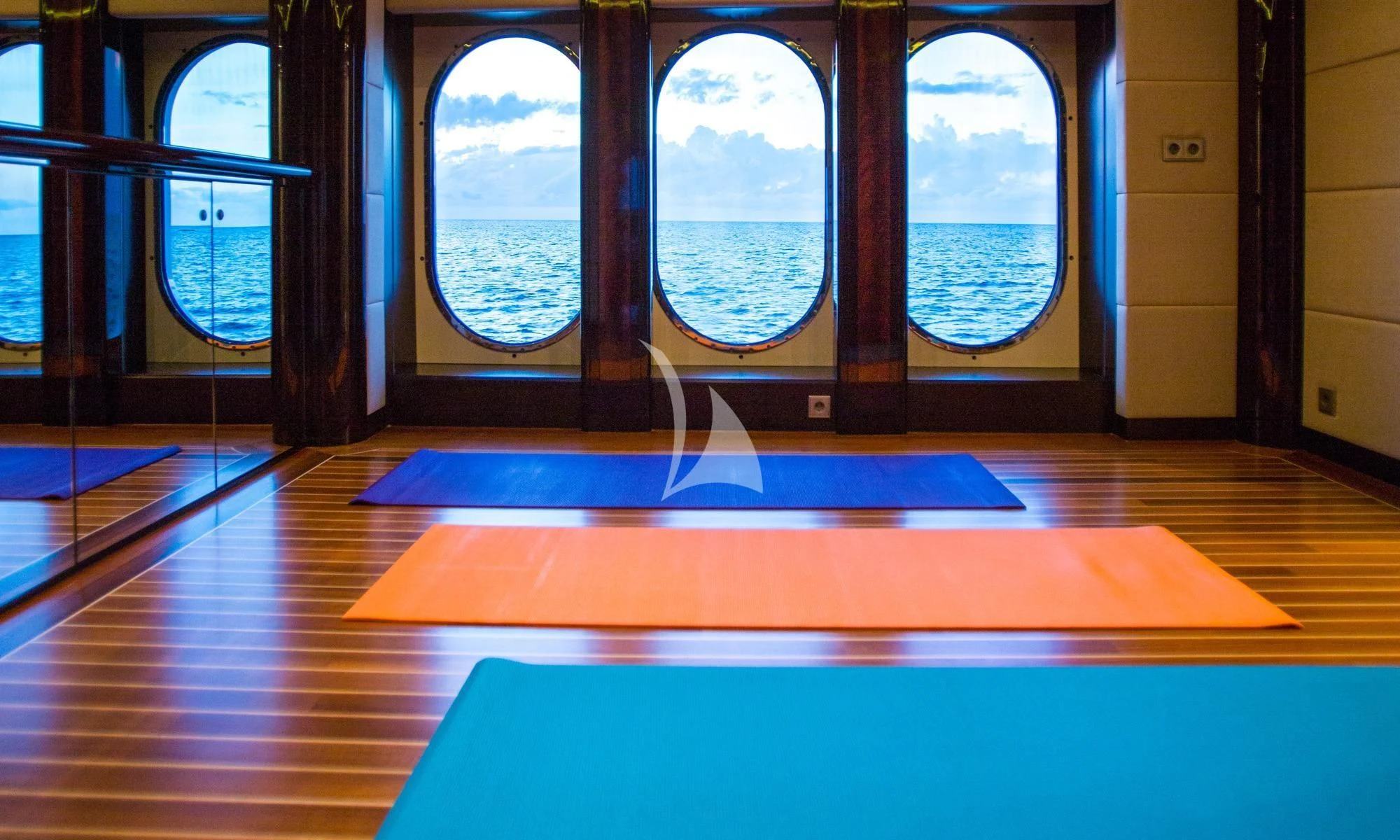 a room with a window and a mat aboard DREAM Yacht for Sale