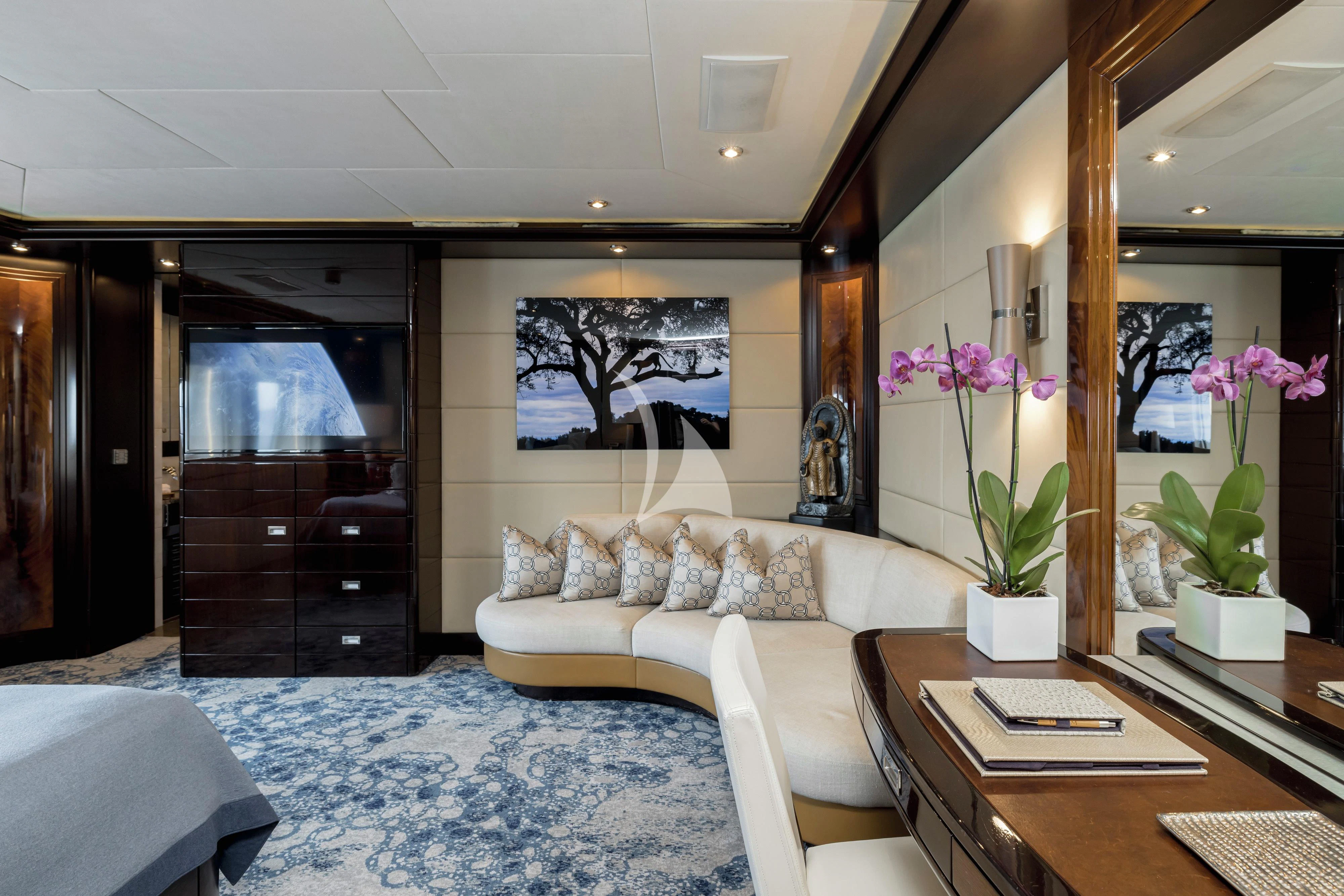 a living room with a large mirror aboard DREAM Yacht for Sale