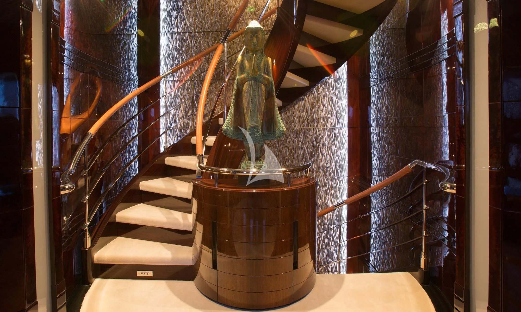 a glass vase with a plant inside aboard DREAM Yacht for Sale