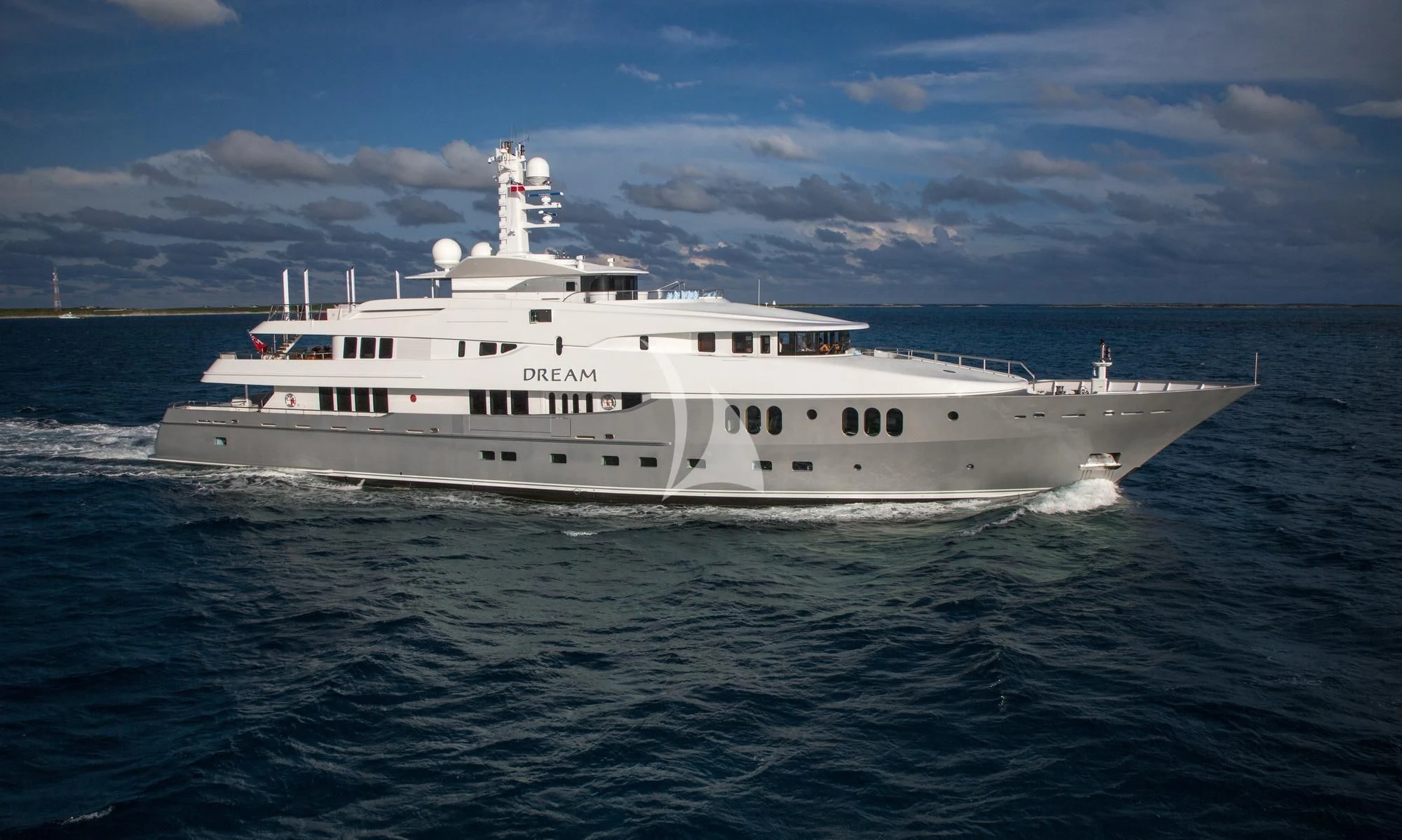 a white boat in the water aboard DREAM Yacht for Sale