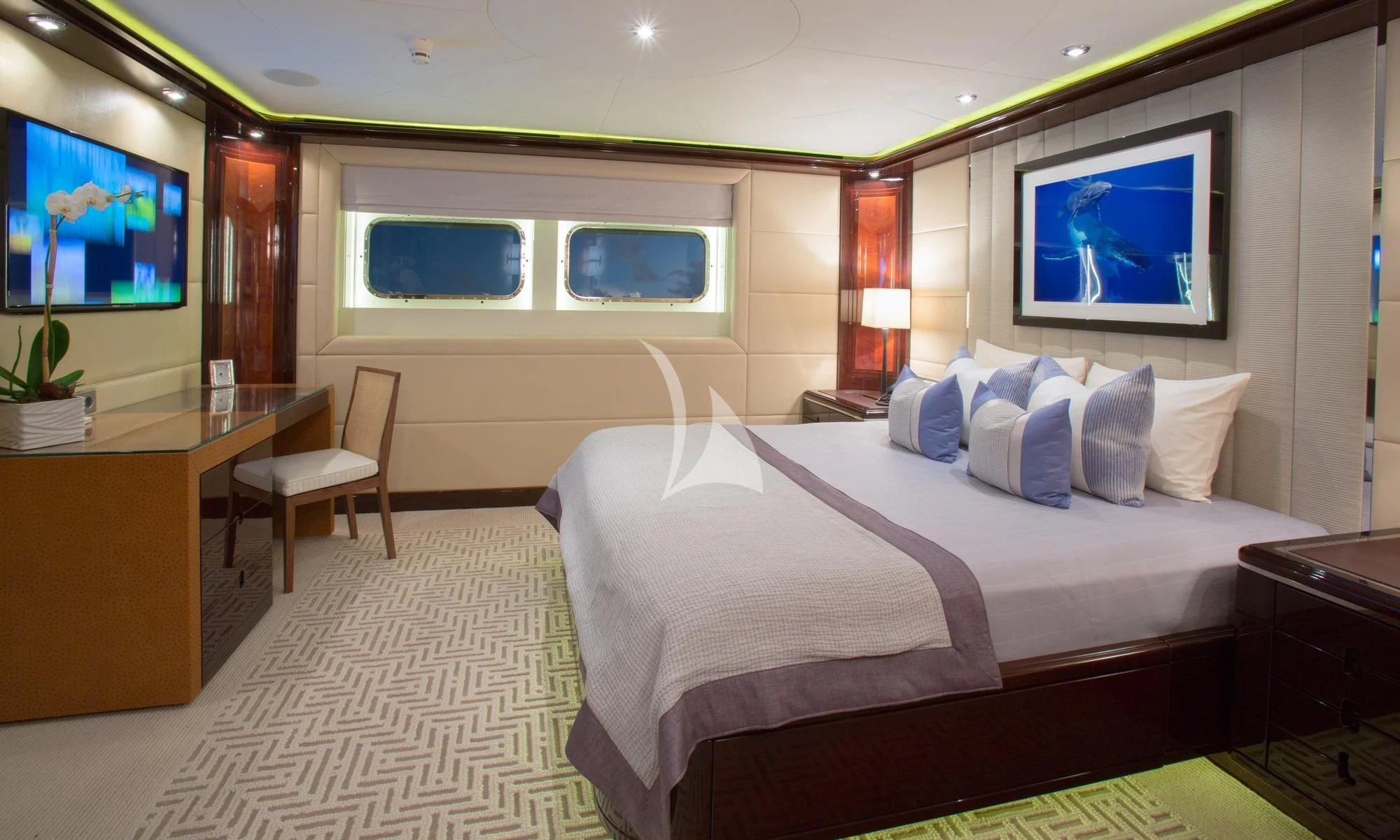 a hotel room with a bed and a tv aboard DREAM Yacht for Sale
