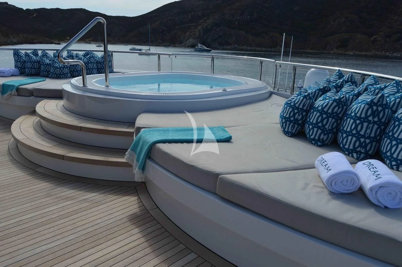 a pool with blue and white towel aboard DREAM Yacht for Sale