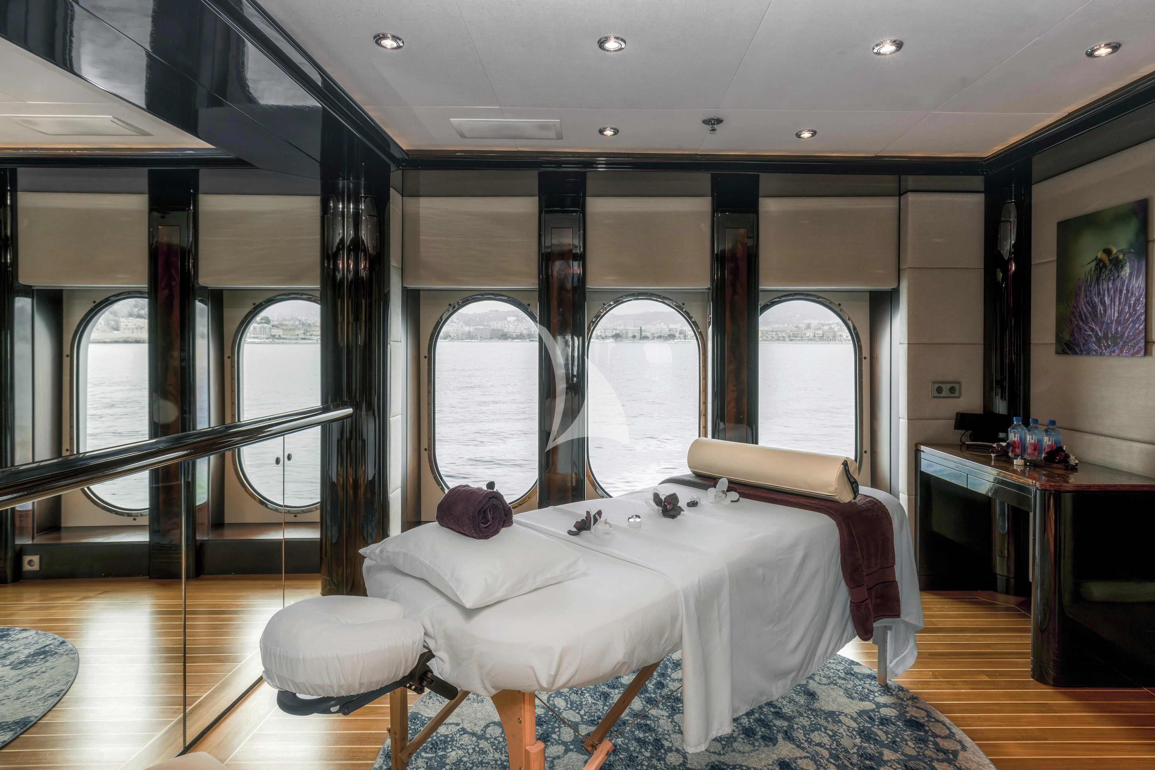 a room with a bed and a window aboard DREAM Yacht for Sale