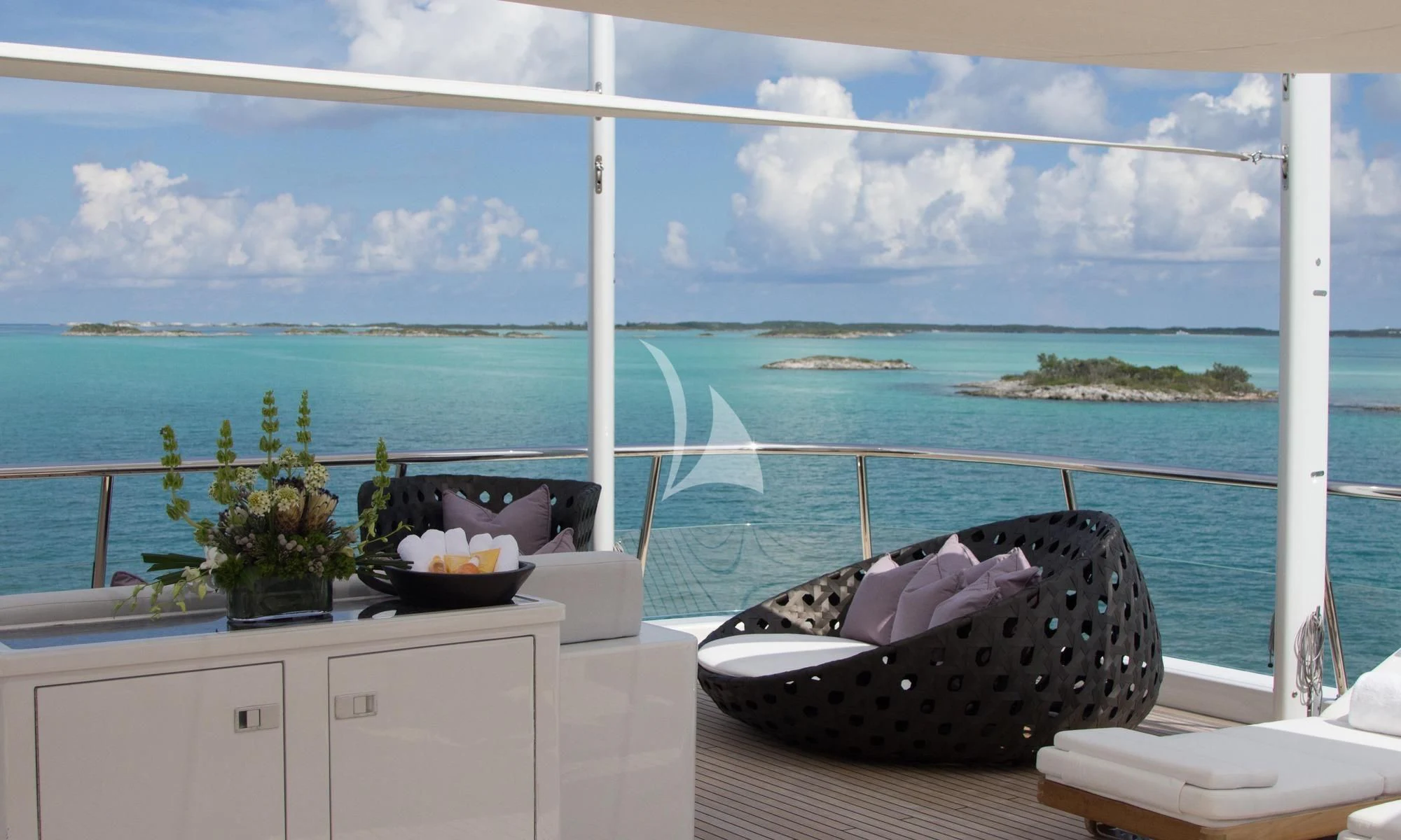 a room with a view of the ocean and a beach aboard DREAM Yacht for Sale