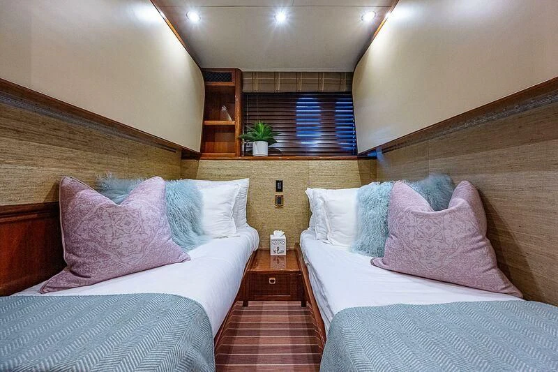 a room with two beds aboard HOPE FLOATS Yacht for Sale