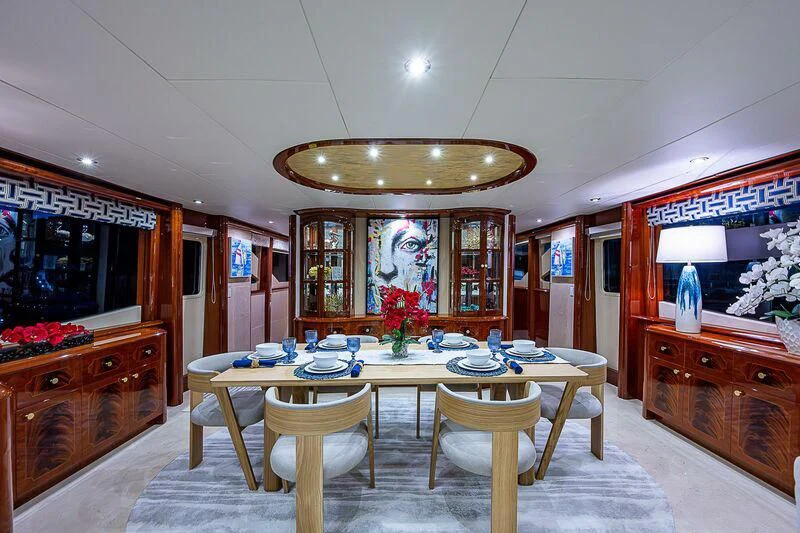 a dining room with a table and chairs aboard HOPE FLOATS Yacht for Sale