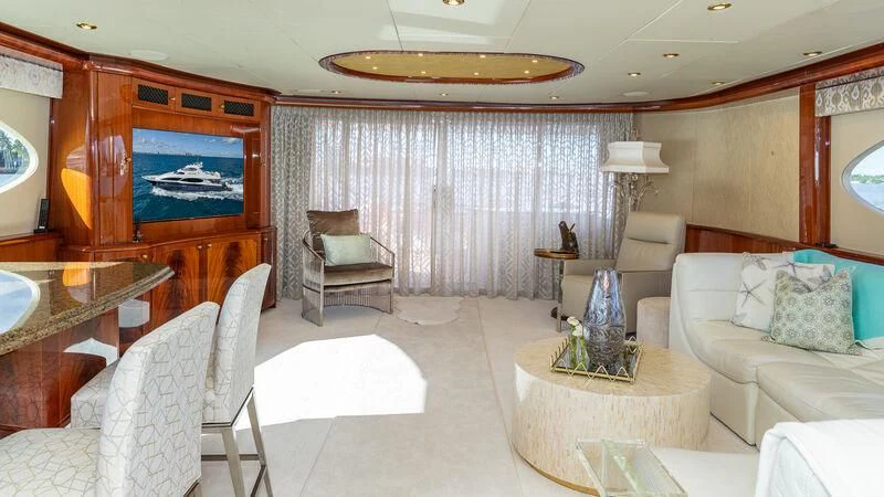 a living room with a large window aboard HOPE FLOATS Yacht for Sale