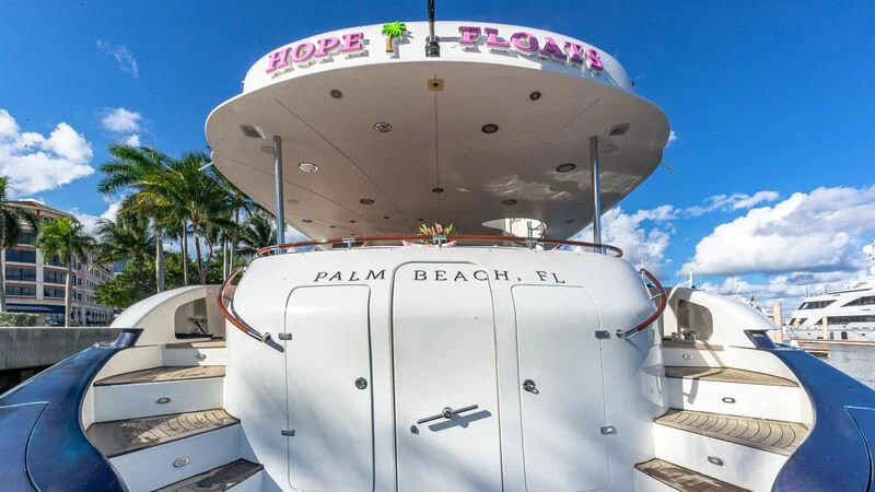 a large white boat aboard HOPE FLOATS Yacht for Sale