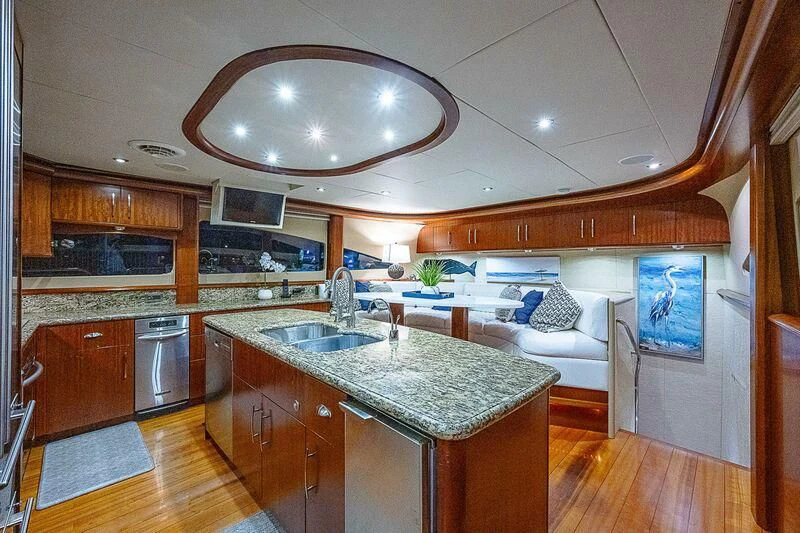 a large kitchen with a large island aboard HOPE FLOATS Yacht for Sale