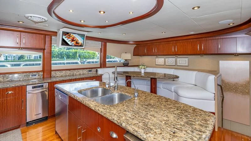 a kitchen with a large island aboard HOPE FLOATS Yacht for Sale