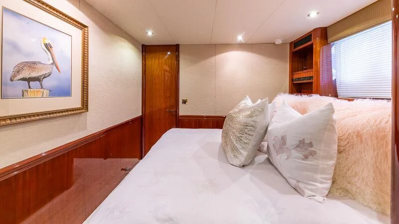 a bed with pillows on it aboard HOPE FLOATS Yacht for Sale