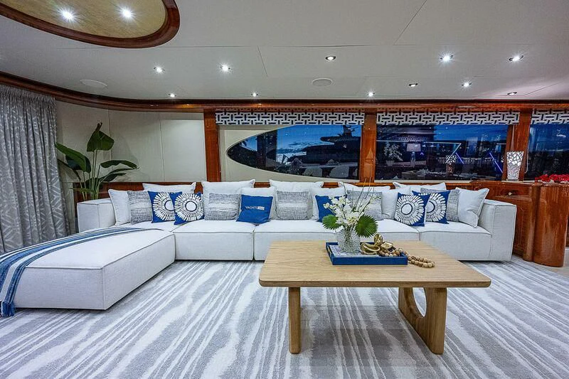 a room with a couch and a table aboard HOPE FLOATS Yacht for Sale