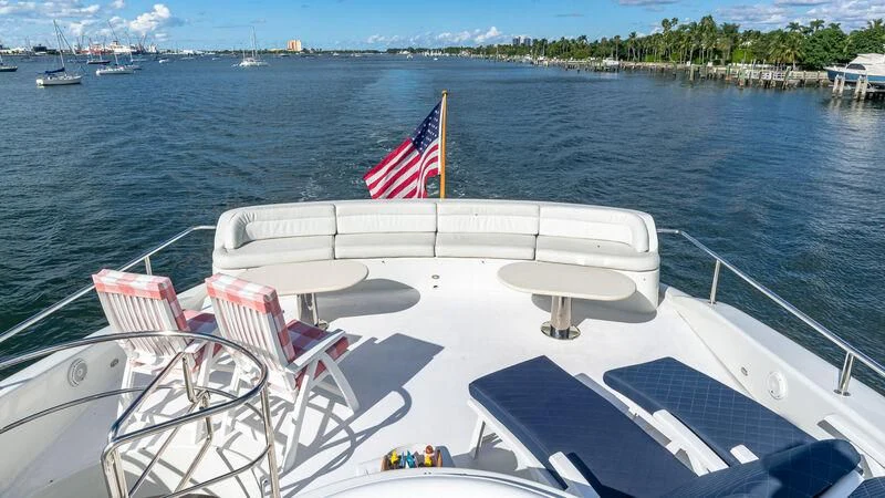 a boat with a flag on it aboard HOPE FLOATS Yacht for Sale