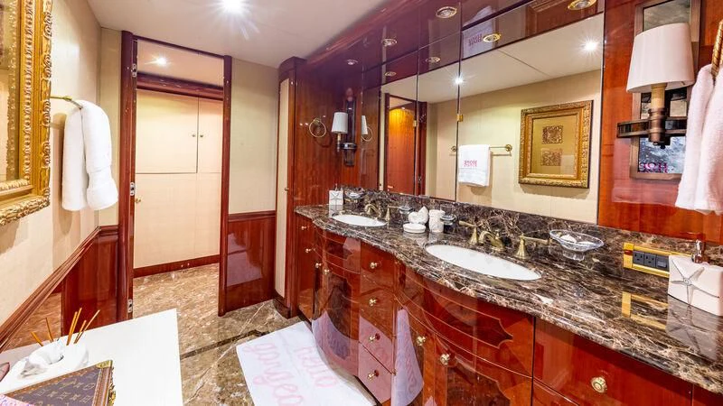 a bathroom with a large mirror aboard HOPE FLOATS Yacht for Sale