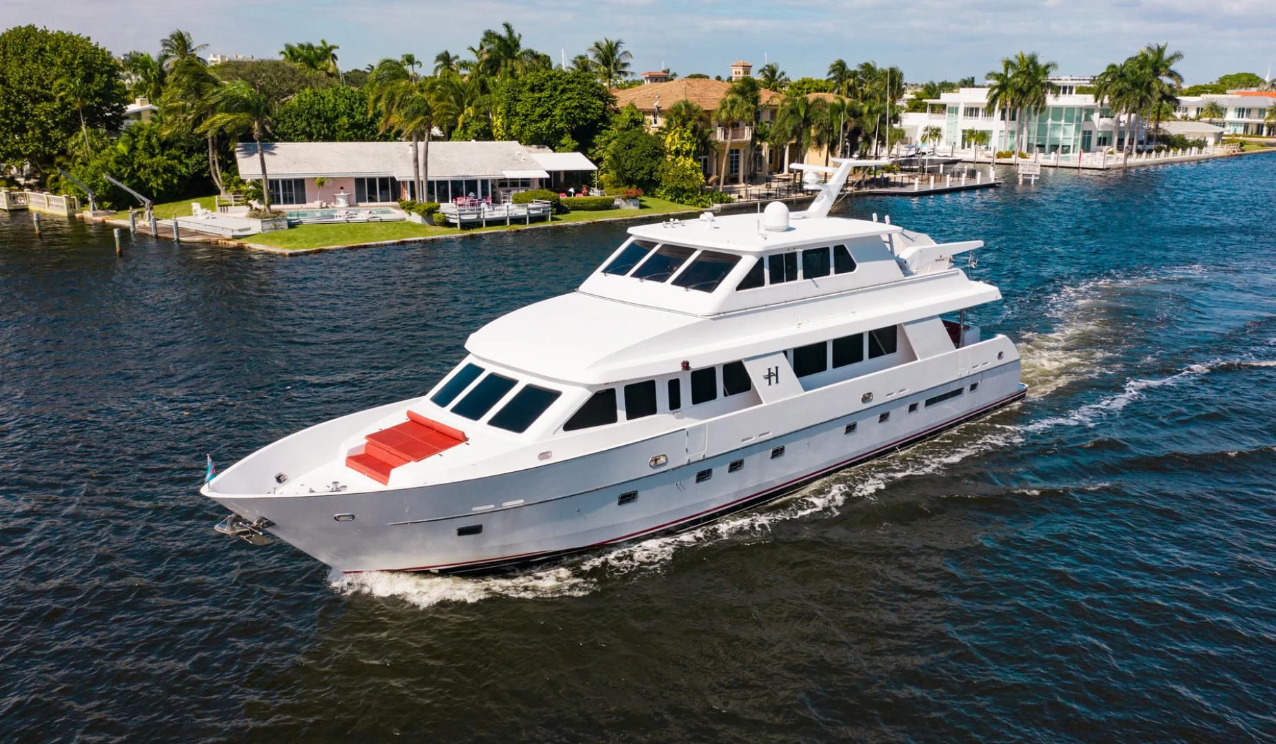a white boat on water aboard BOXES II Yacht for Sale