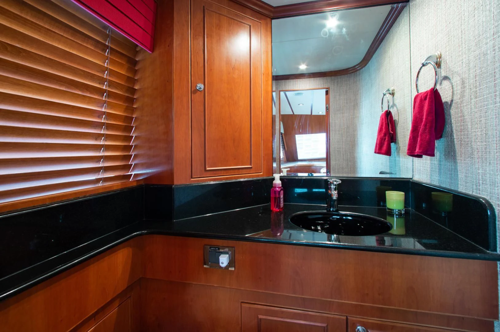 a kitchen with a black countertop aboard BOXES II Yacht for Sale