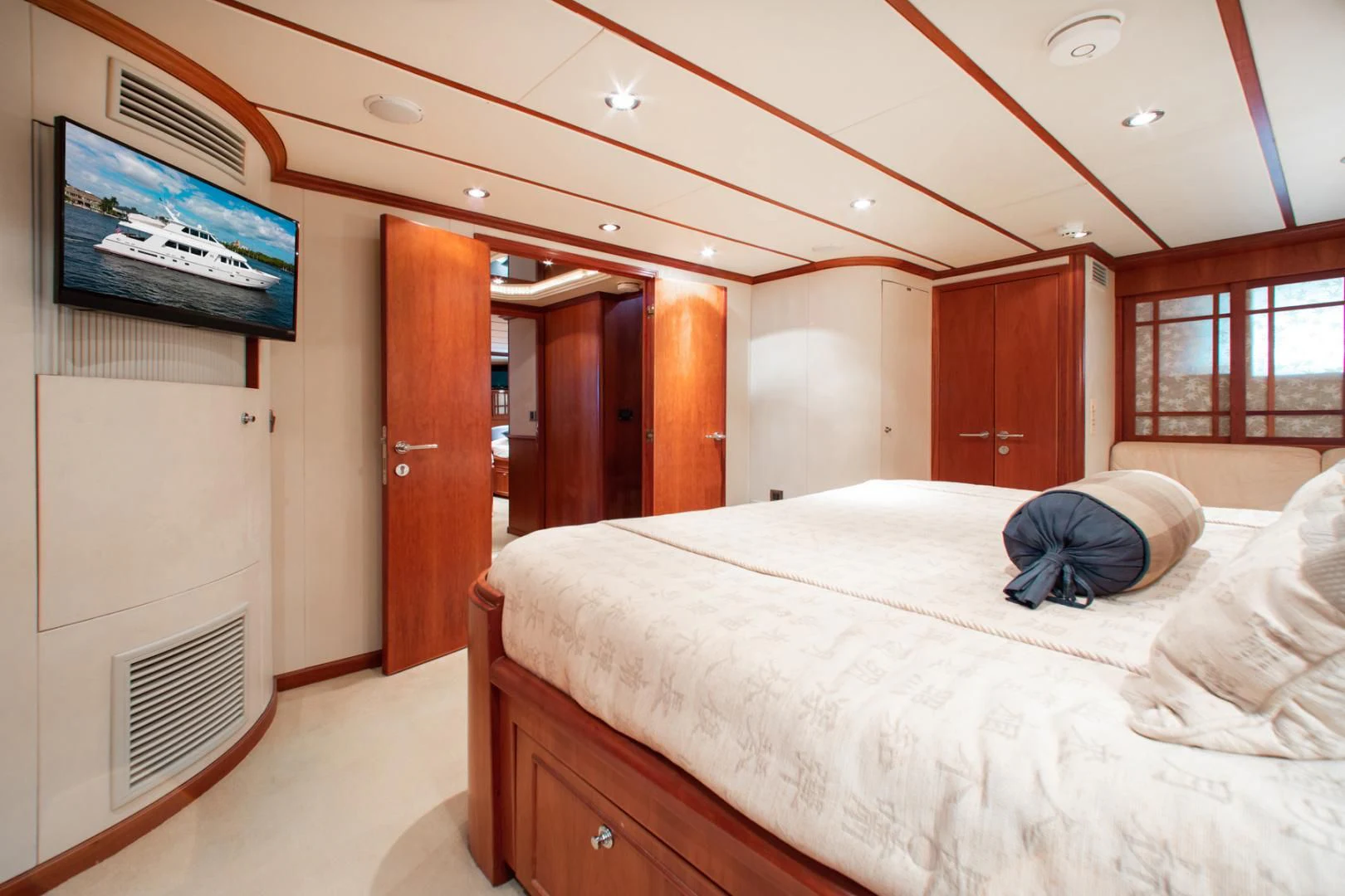 a person lying on a bed aboard BOXES II Yacht for Sale