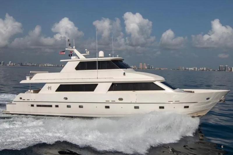 a white yacht in the water aboard BOXES II Yacht for Sale