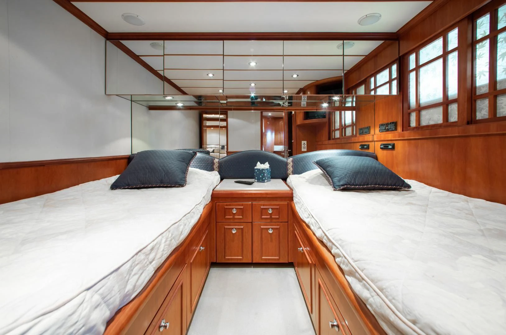 a room with two beds aboard BOXES II Yacht for Sale