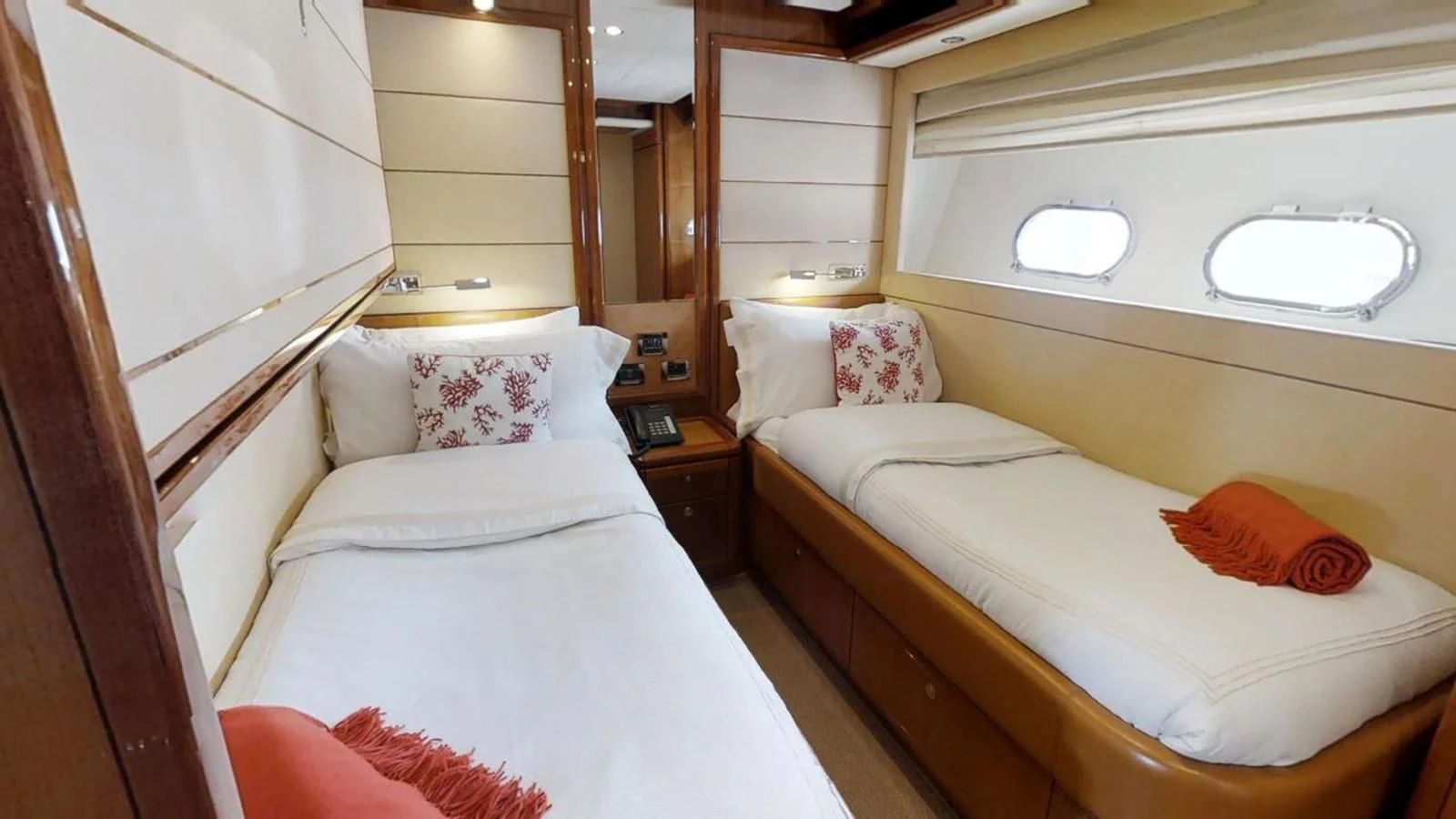 a couple of beds in a room aboard INDULGE II Yacht for Sale