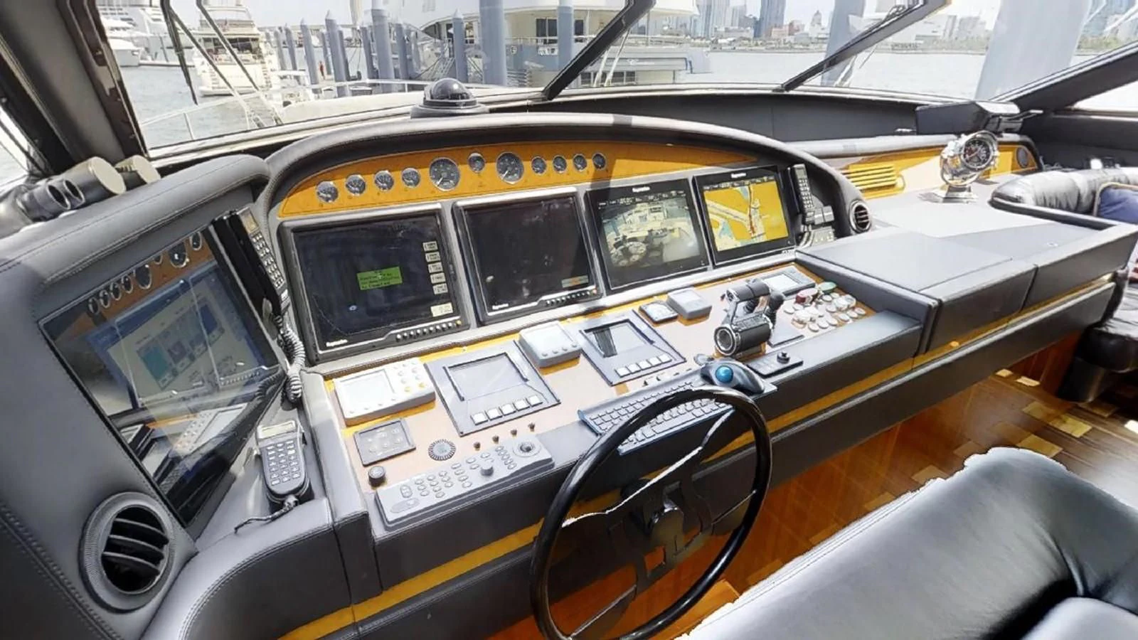 inside of a yellow cockpit aboard INDULGE II Yacht for Sale