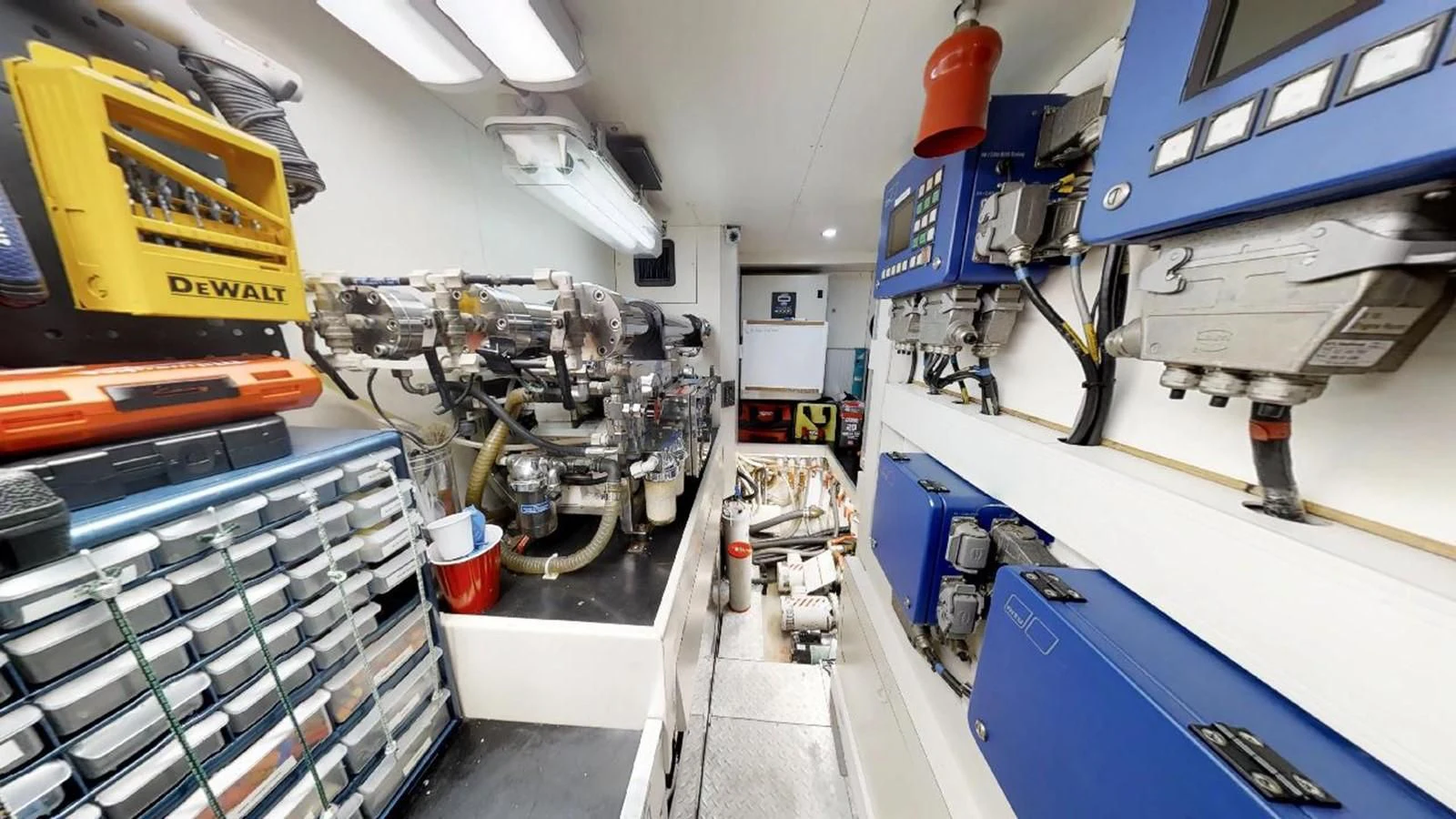 a room with machinery aboard INDULGE II Yacht for Sale