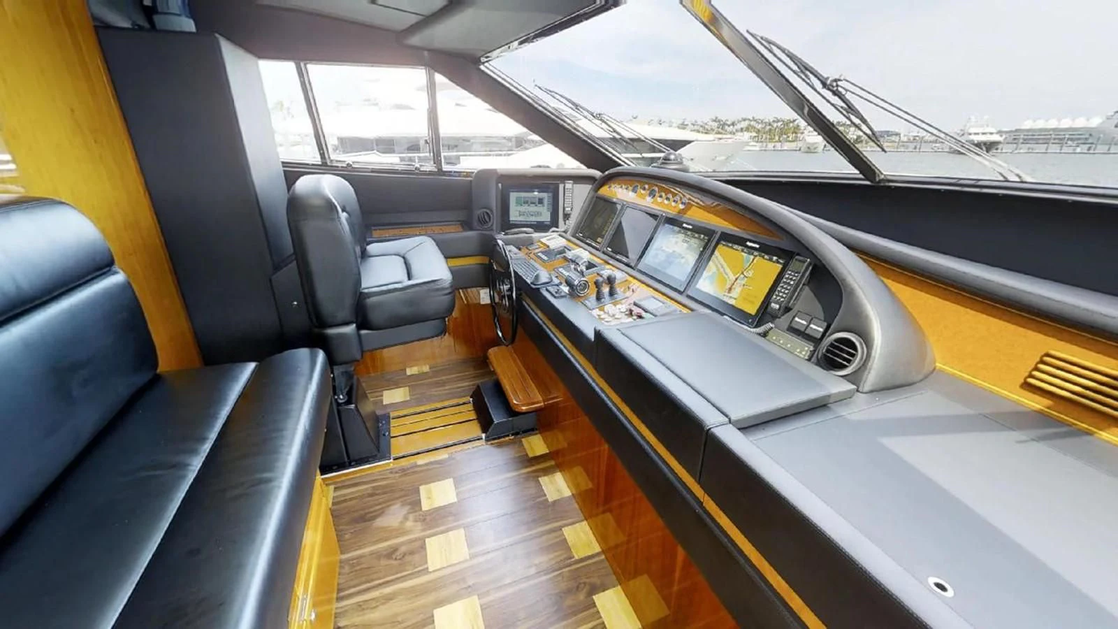 inside of a car aboard INDULGE II Yacht for Sale