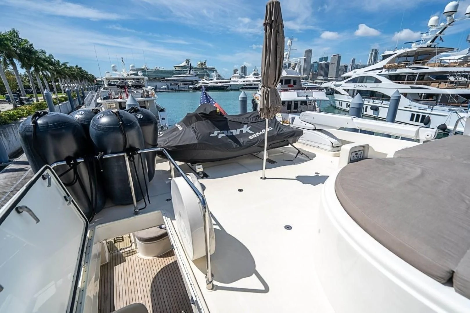 a boat with a steering wheel aboard INDULGE II Yacht for Sale