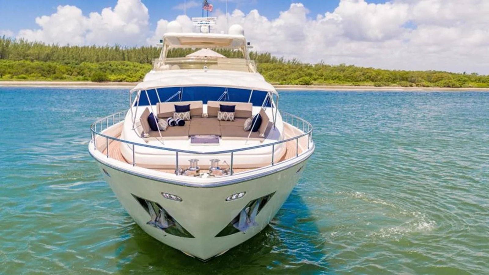 a boat in the water aboard INDULGE II Yacht for Sale