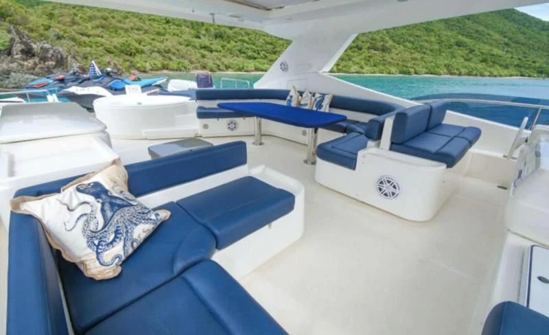 a group of boats on a beach aboard INDULGE II Yacht for Sale