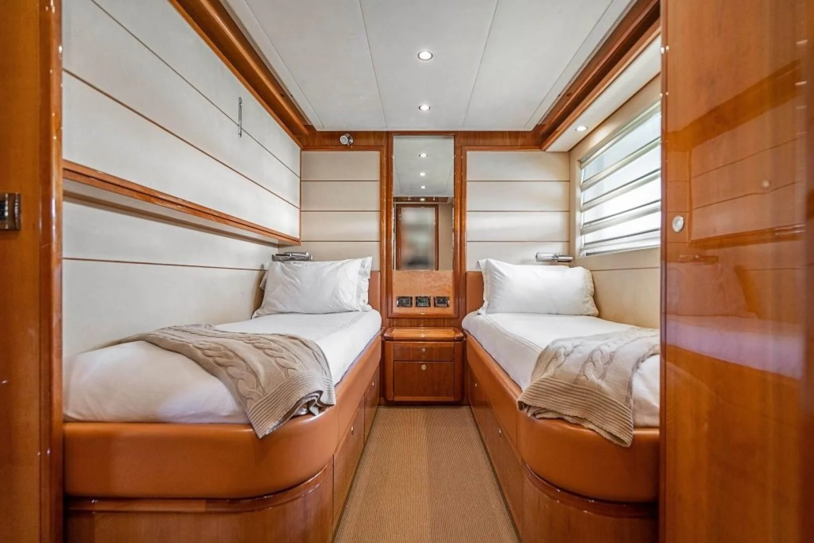 a couple of beds in a cabin aboard INDULGE II Yacht for Sale