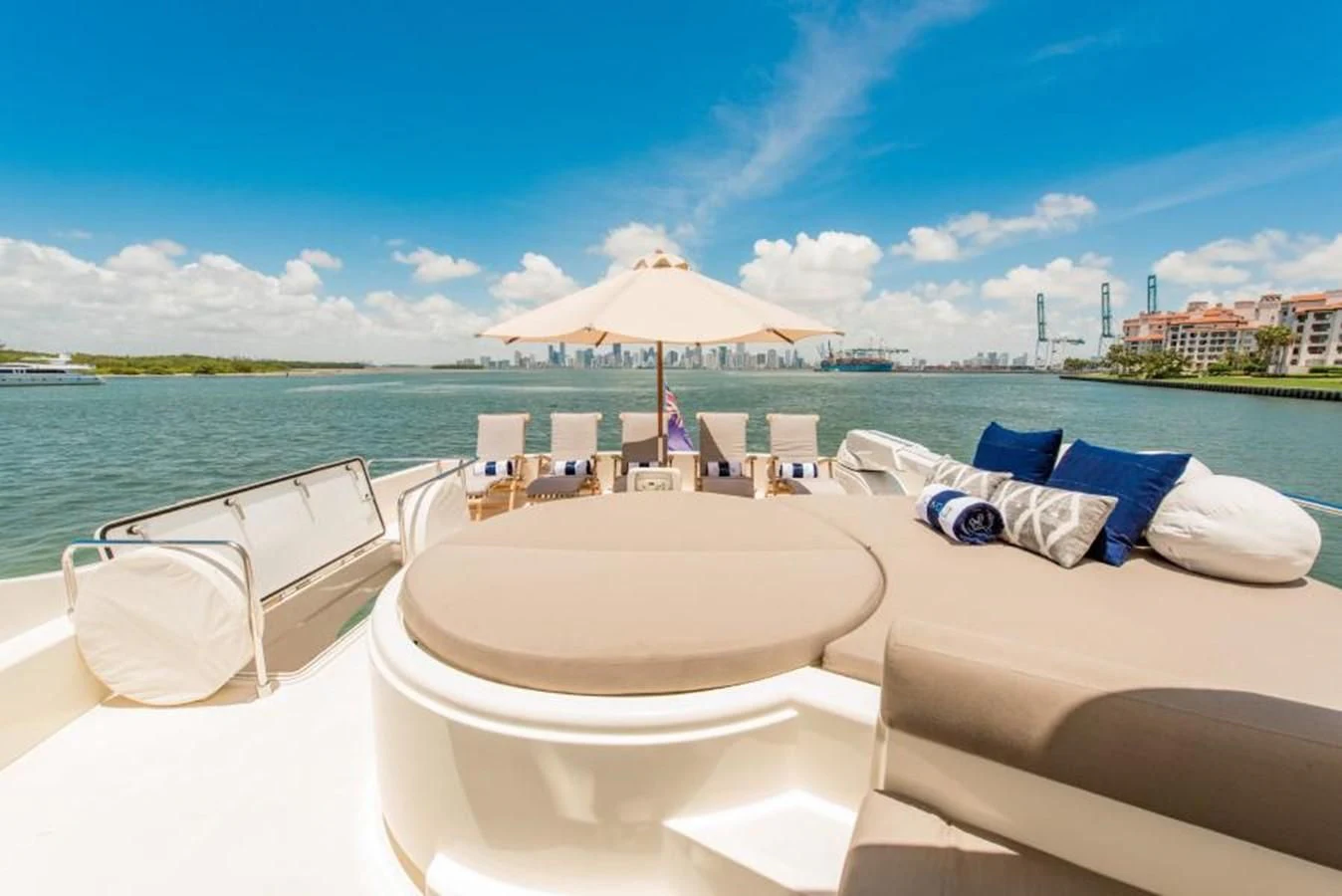 a lounge chair on a beach aboard INDULGE II Yacht for Sale