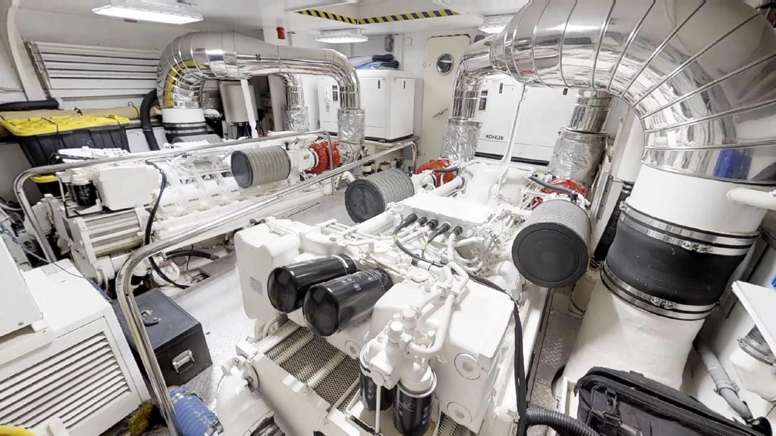 a large white machine with many tubes aboard INDULGE II Yacht for Sale