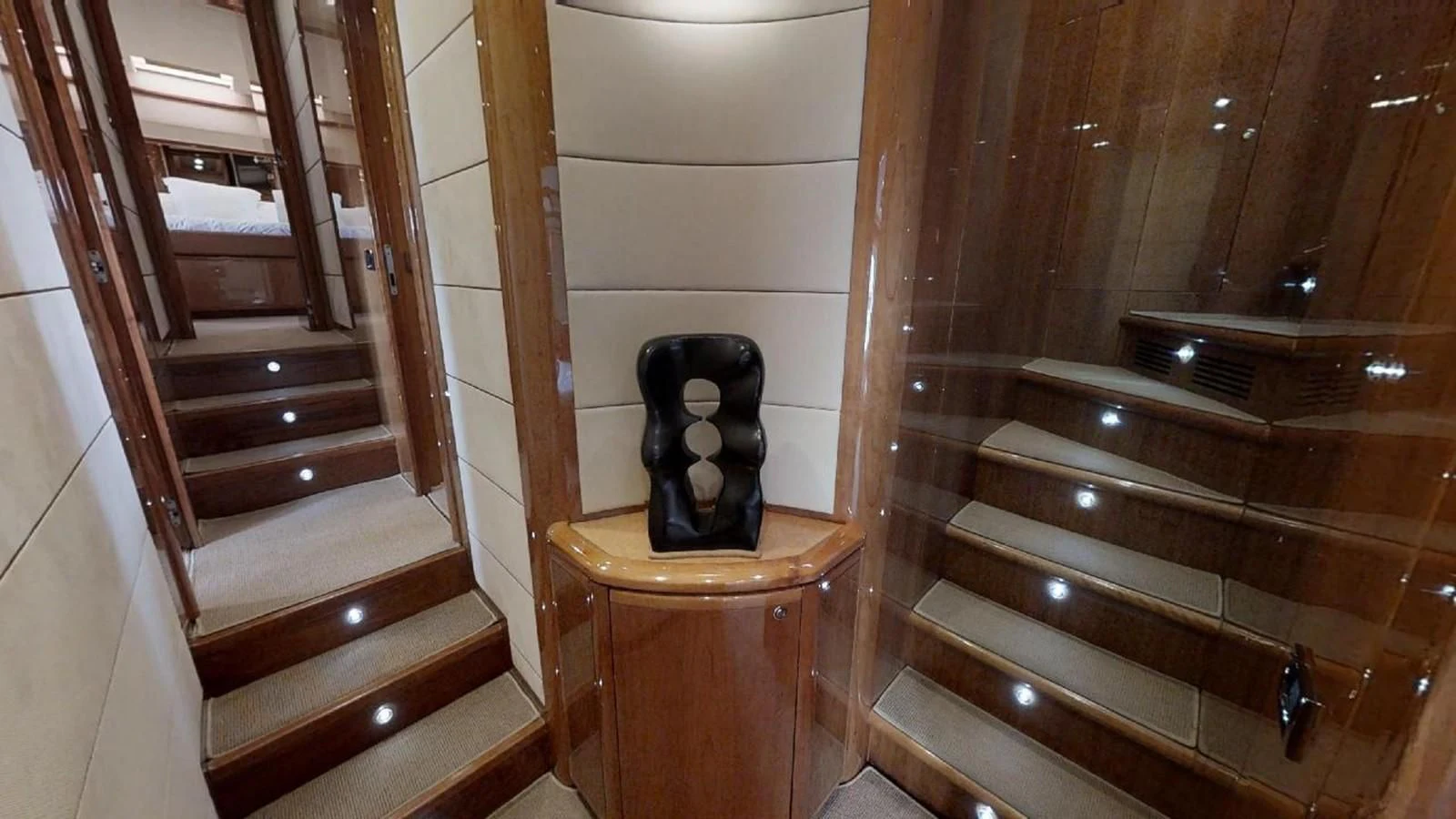 a black boot on a wooden platform aboard INDULGE II Yacht for Sale