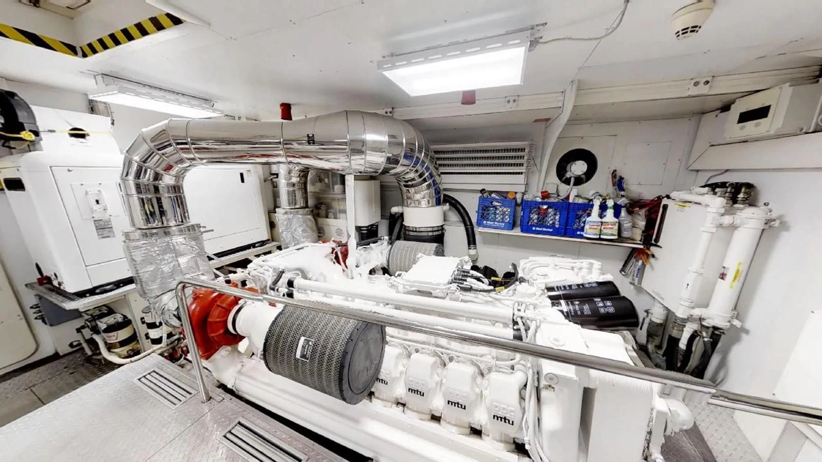 a room with machinery aboard INDULGE II Yacht for Sale