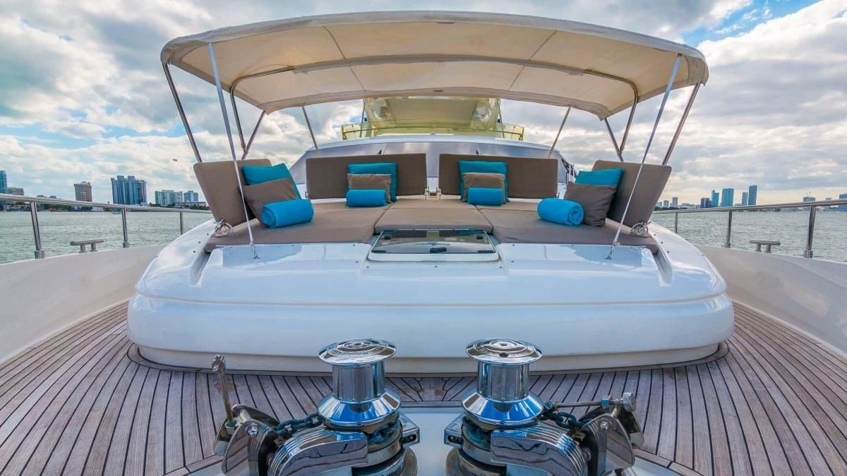 a boat on a deck aboard INDULGE II Yacht for Sale