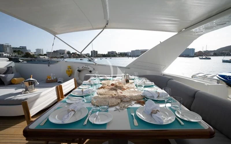 a table with food on it aboard CAROM Yacht for Sale