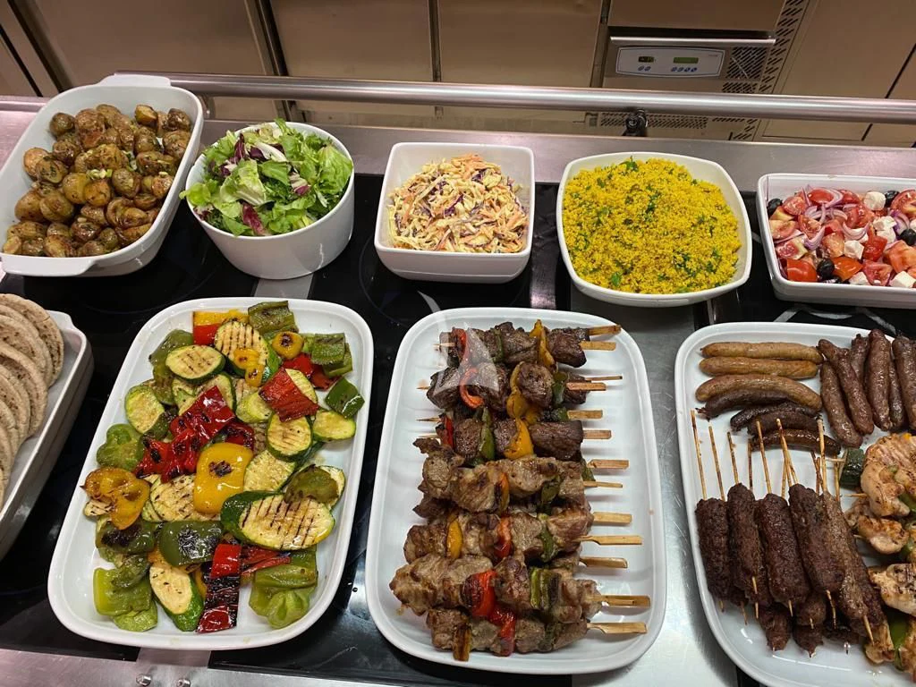 a table full of food aboard CAROM Yacht for Sale