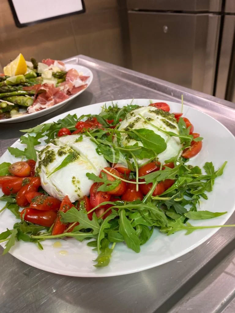 a plate of food aboard CAROM Yacht for Sale