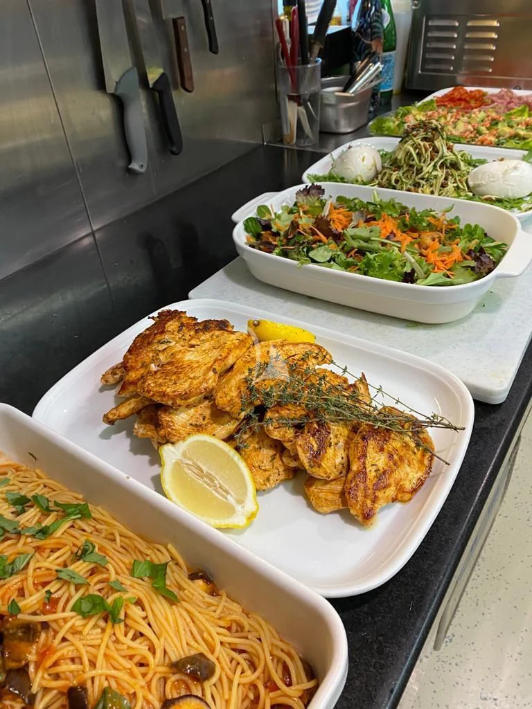 a tray of food aboard CAROM Yacht for Sale