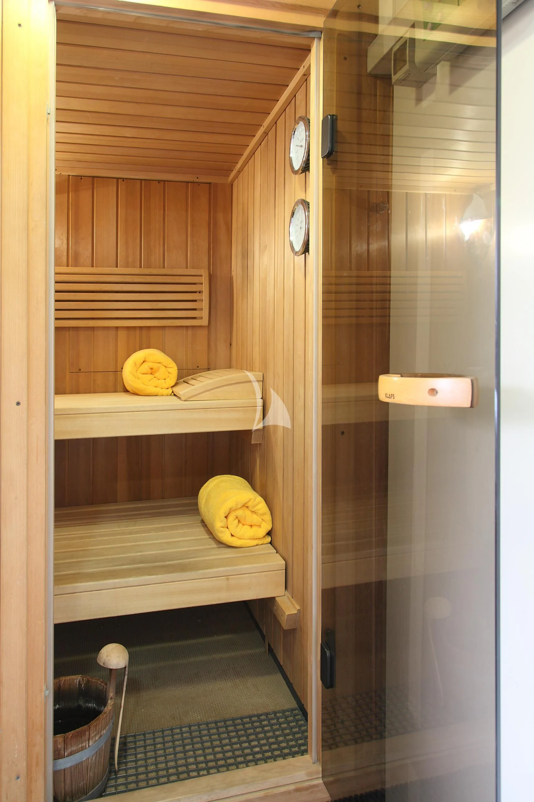 a room with a closet and a bed aboard CAROM Yacht for Sale