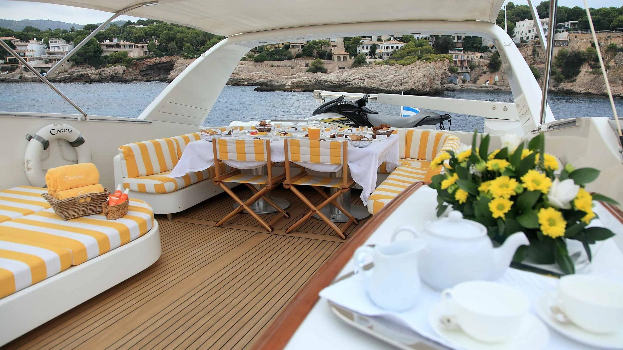 a table with food on it aboard CAROM Yacht for Sale