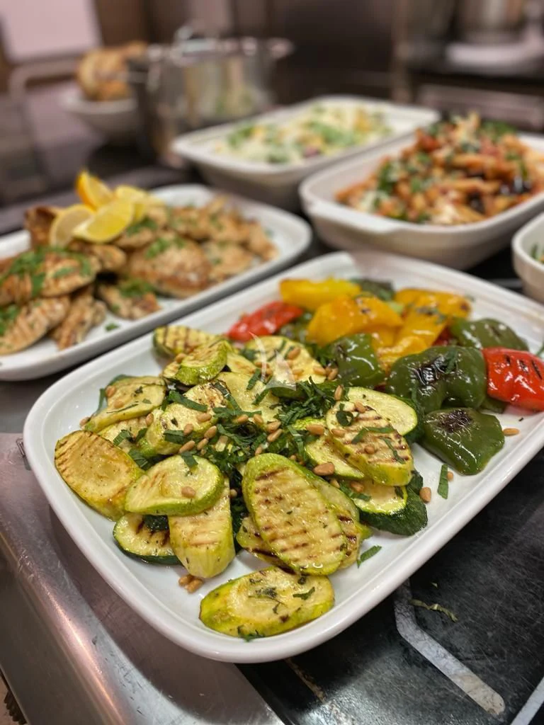 a table full of food aboard CAROM Yacht for Sale